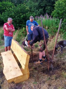 Setting the bench in place with the right view - a work of science on a slope !