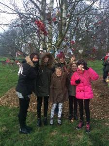 Hanging decorations on the Advent Tree at the start